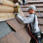 An Erie Home Installer - Installing a Metal Roof.