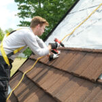 An Erie Home Installer - Installing a Metal Roof.