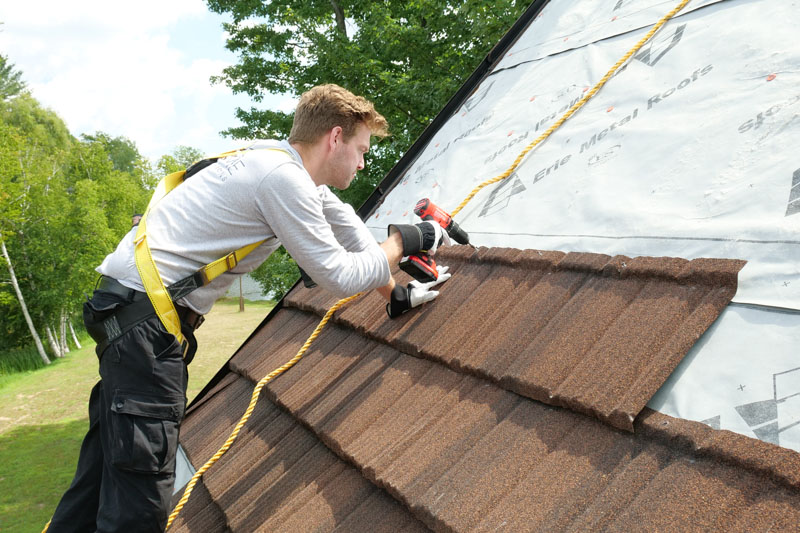 An Erie Home Installer - Installing a Metal Roof.