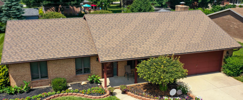 A Beautiful Erie Home Metal Roof featuring Countryblend Metal Shingles