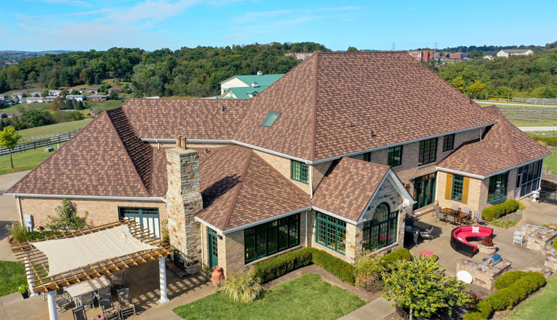 A Beautiful Erie Home Metal Roof featuring HD Cottage Shingles