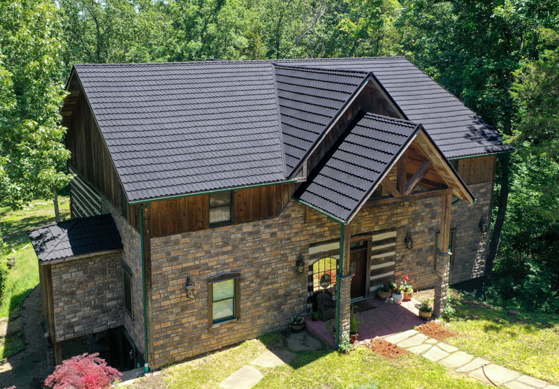 A Beautiful Erie Home Metal Roof featuring Charcoal Pacific Tile Shingles