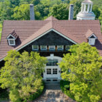 A Beautiful Erie Home Metal Roof featuring a Barclay Pinecrest Roof
