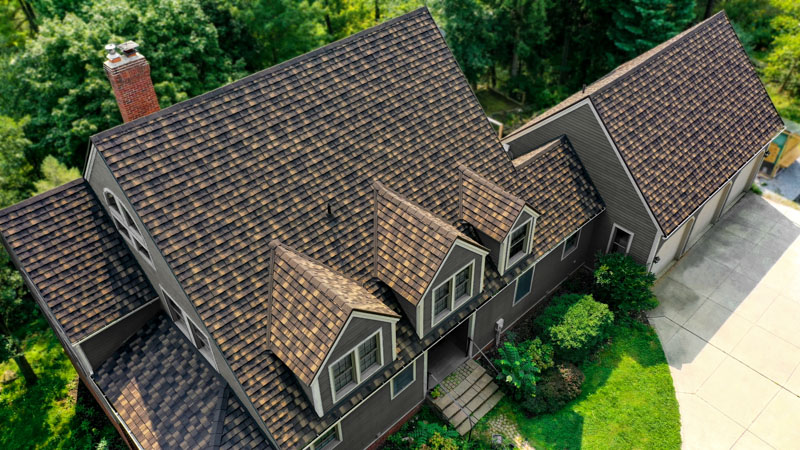 A Beautiful Erie Home Metal Roof featuring a Timberwood Roof