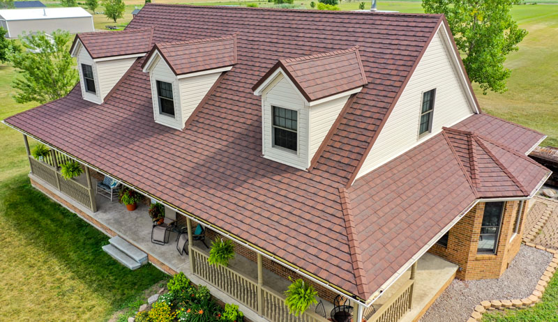 A Beautiful Erie Home Metal Roof featuring a Barclay Metal Shingle Roof.