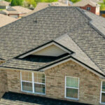 A Beautiful Erie Home Metal Roof featuring a Charcoal HD-Cottage Roof