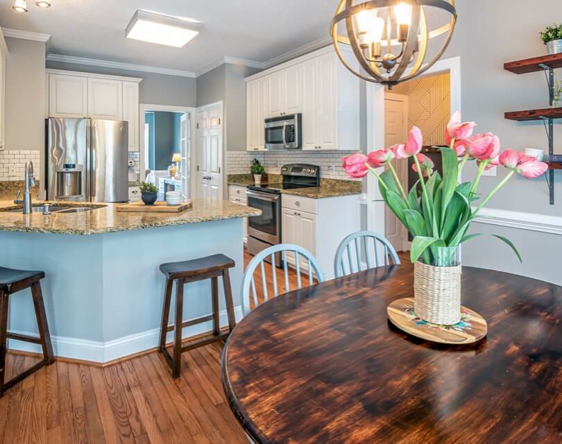Updated kitchen with flower centerpiece