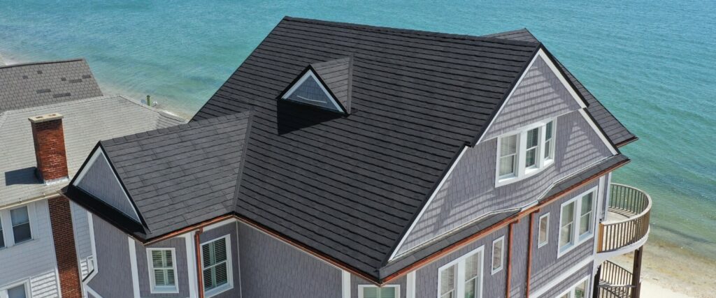 Medium Gray Shake Siding Home with Metal Roof, Charcoal