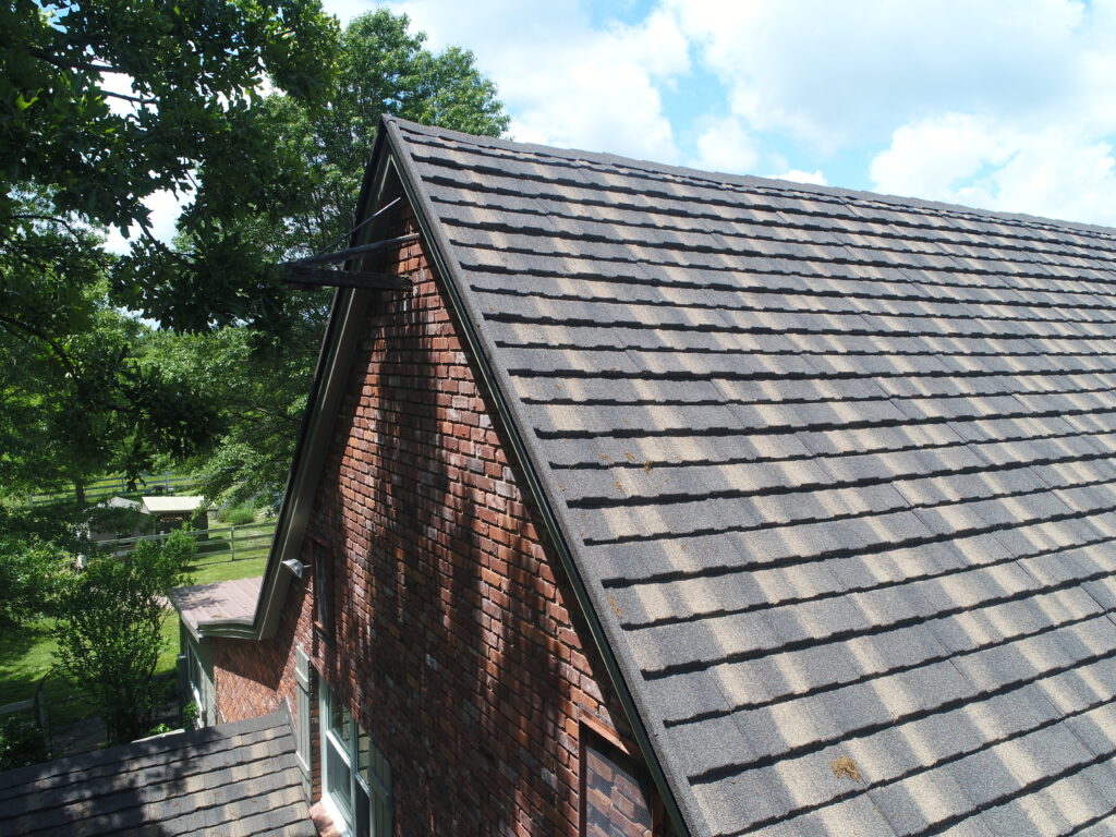 metal roof on a brick house