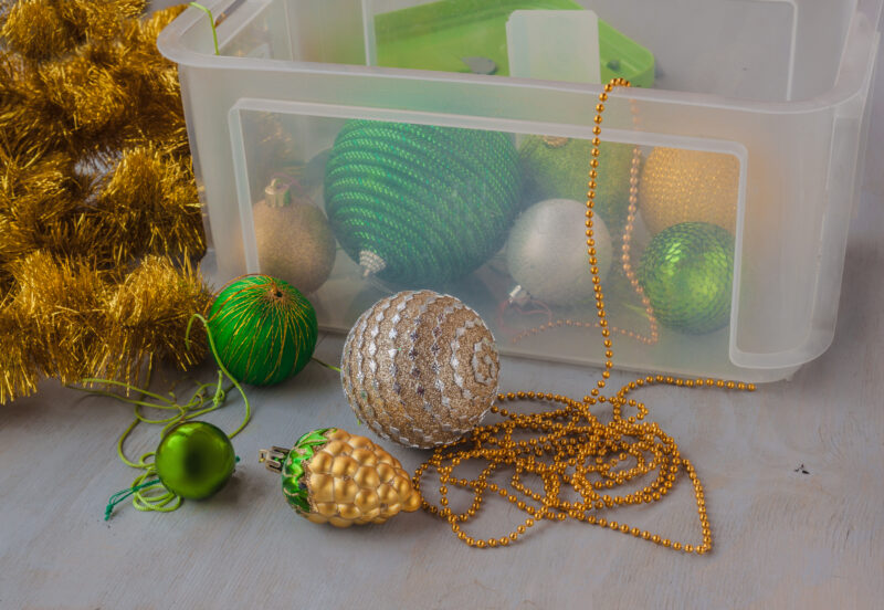 Christmas decorations in a plastic storage bin